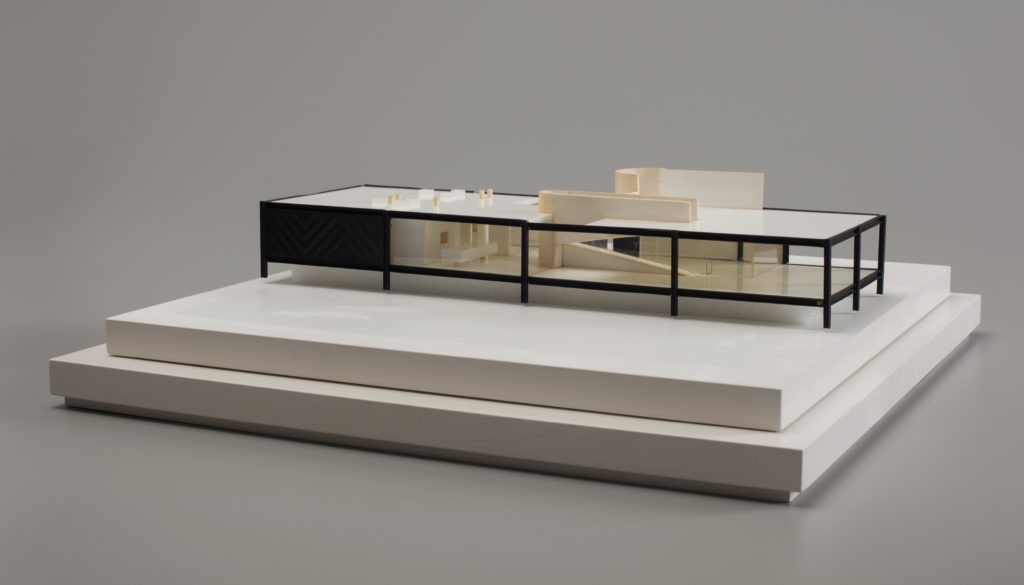 Architectural model of modernist house with flat roof 